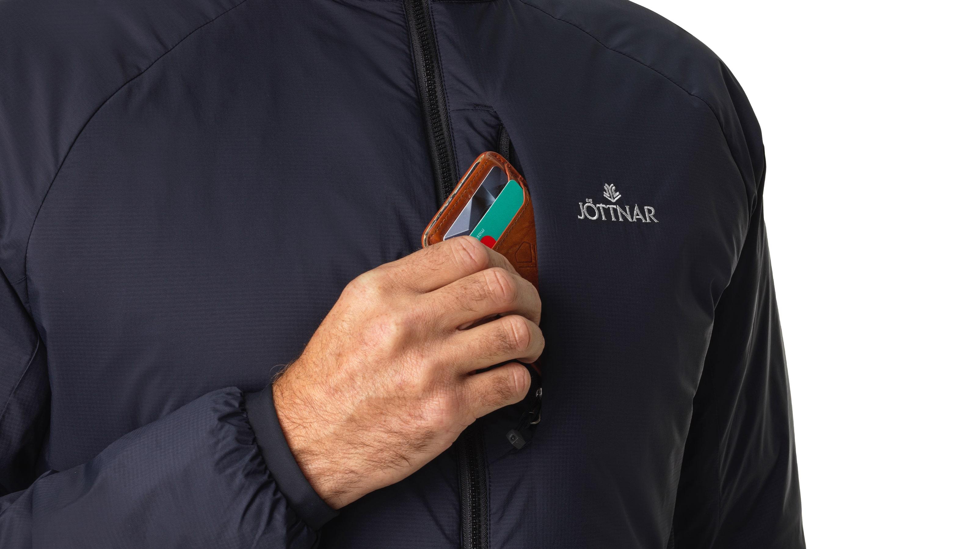 tech:Easy access external chest pocket for secure valuables storage.