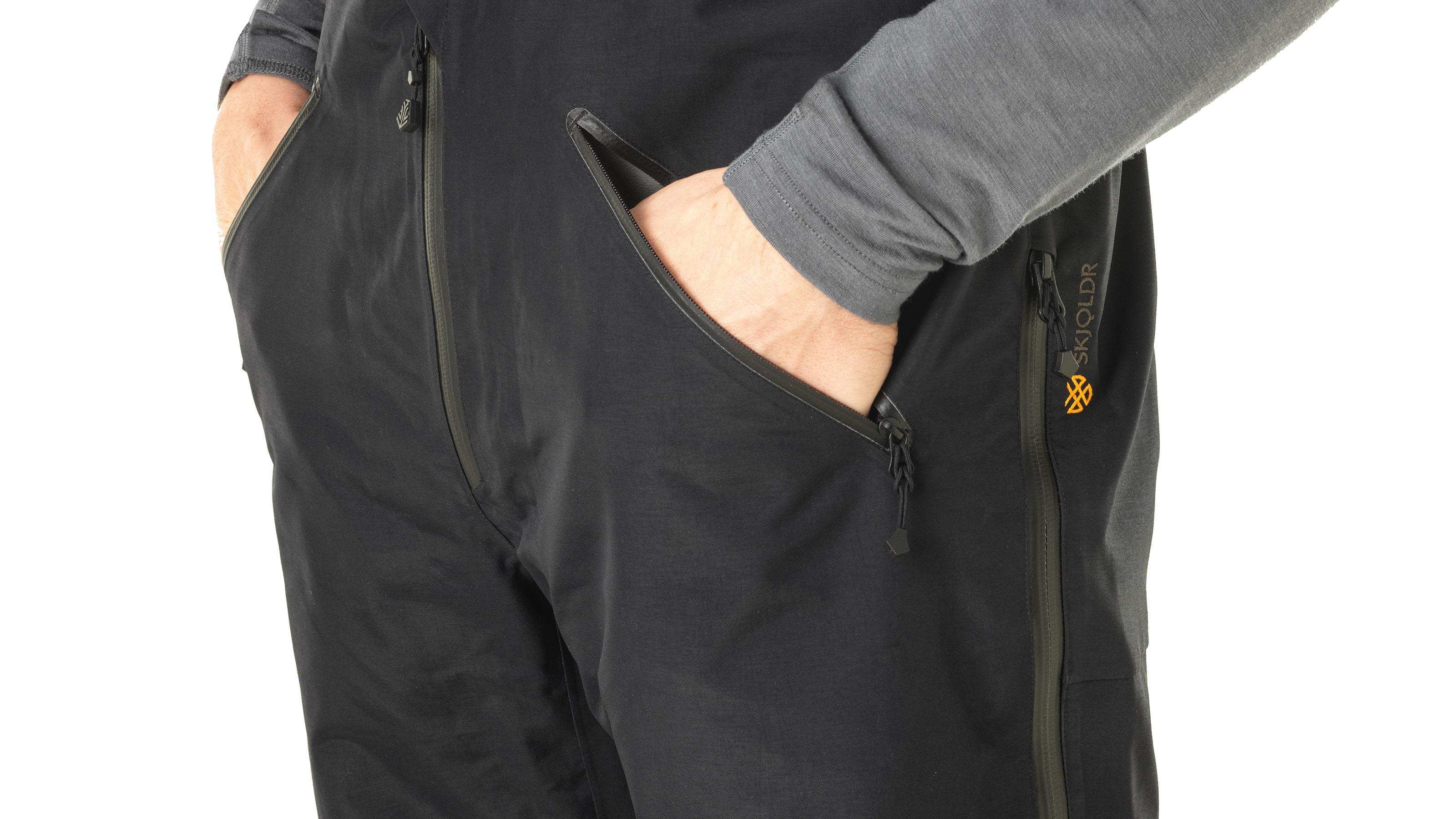 tech:Twin hip pockets for valuables storage and for hand warmth on the walk-in. YKK® AquaGuard® coil zips are water repellent, flexible and hard wearing.